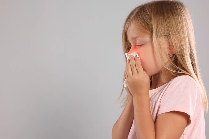 Suffering,From,Allergy.,Little,Girl,With,Tissue,Sneezing,On,Light