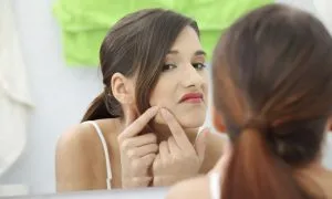 girl-acne-zit-beauty-emergency-spry.jpg