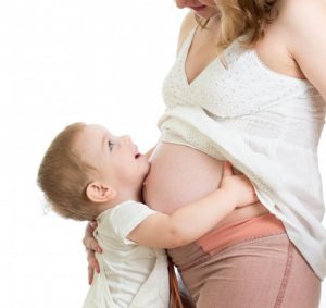 bigstock-little-boy-hugging-pregnant-mo-40255048.jpg