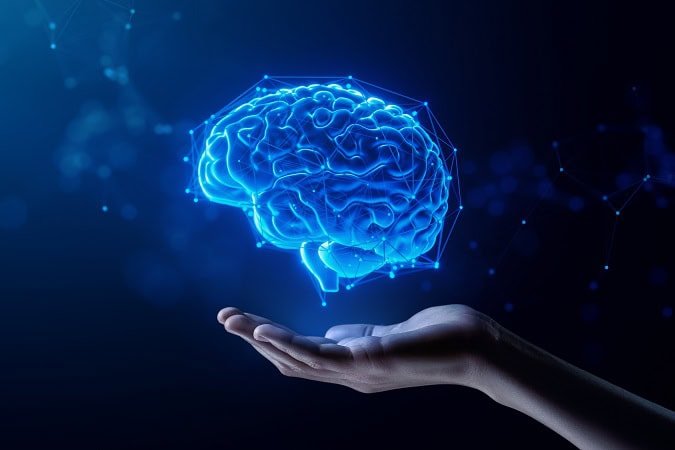 Hand,Holding,Human,Brain,-,Futuristic,Concept,Of,Intelligence,,Science