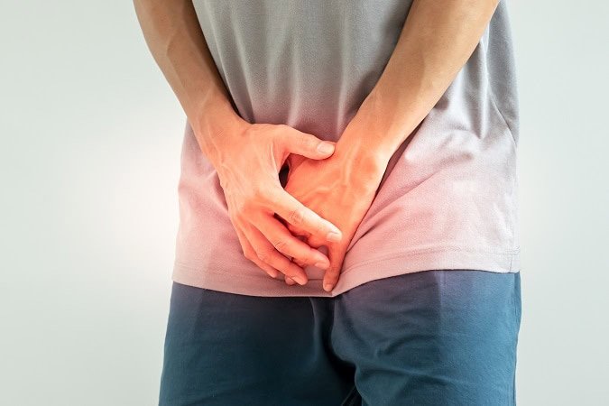 Man,Hold,Hand,In,Front,Of,Private,Parts,Feeling,Discomfort